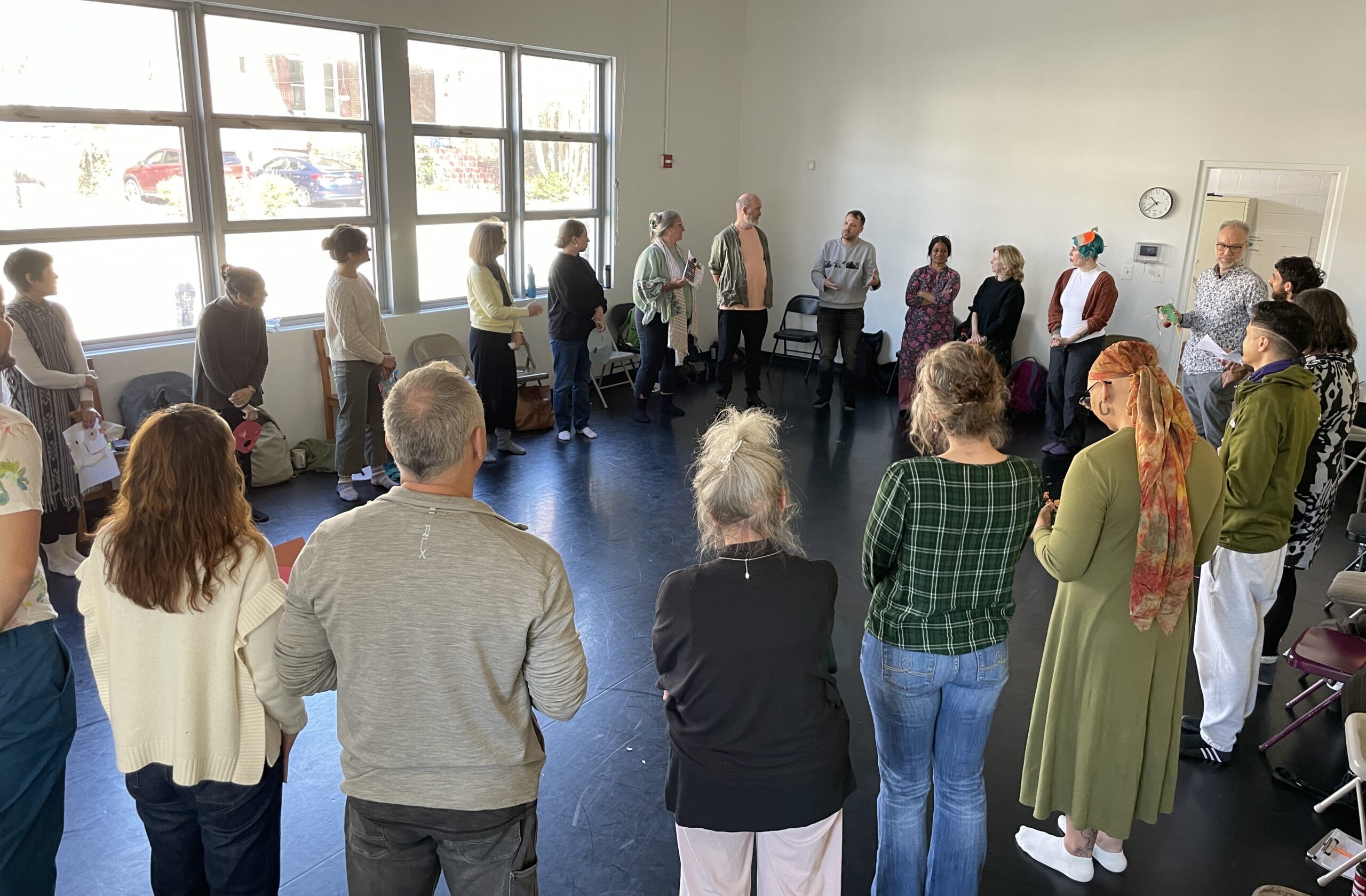Practitioners of CRP stand in a circle